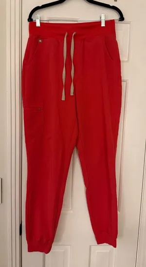 Red FIGS scrub pants in size Medium Tall  thumbnail 1