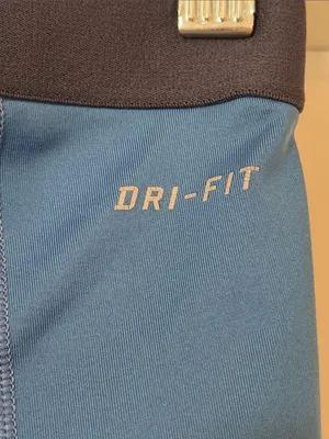 Nike Blue Compression Shorts with Black Waistband and Yellow Swoosh thumbnail 6