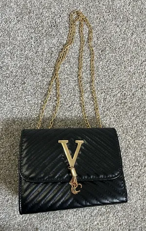 Black going out purse thumbnail 1