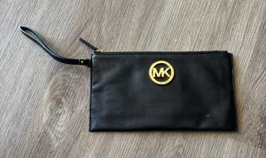 Michael Kors Black Leather Wristlet with Gold MK Medallion thumbnail 1