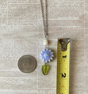 Handmade unique funky cute light blue ceramic sun & Czech glass leaf & freshwater pearl necklace☀️🌿 thumbnail 8
