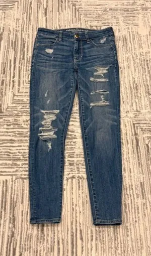 American Eagle Outfitters women's size 4 blue distressed Hi-Rise Jegging Jeans thumbnail 1