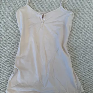 Brandy Melville Women's Cream Spaghetti Strap Top thumbnail 1