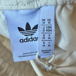 NWOT adidas Cream Track/Jogger Pants with ICONIC Side Stripes Size Medium thumbnail 3