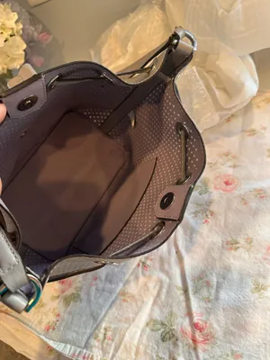 Michael Kors perforated bucket-style bag in gray thumbnail 9