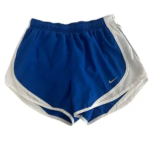 Nike Women's Royal Blue Athletic Shorts with White Panels thumbnail 1
