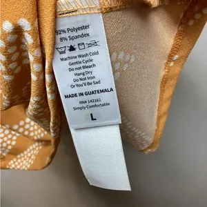 LulaRoe Alana ruffle flounce top. Mustard Gold Cream Palm design Large thumbnail 8