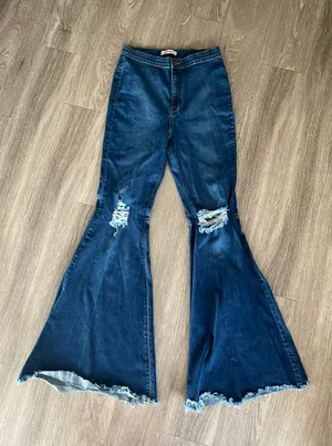 Vibrant Miu Blue Distressed Bell Bottoms Jeans thumbnail 1