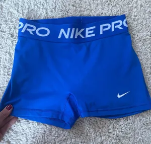 Nike women’s mid rise 3” biker shorts thumbnail 1