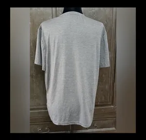 QuikSilver Gray /Charcoal T-shirt - size Large. Gently Warn & in excellent condition. Innovate your future printed on back tail. True color is the ones with measurements. Measurements approximately 22” from armpit to armpit x 26” long. Non-smoking home. priced to sell at as is condition. Don’t like my price, make reasonable offer! And thank you for checking my closet. thumbnail 2