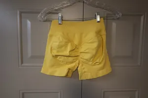 Workout booty shorts bundle of XS's exercise shorts in yellow and brown. thumbnail 2