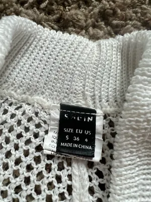 SheIn Airy crochet knit with openwork pattern. Elastic waistband for easy fit. Scalloped hem adds feminine detail. Lightweight and breathable for warm days. thumbnail 4