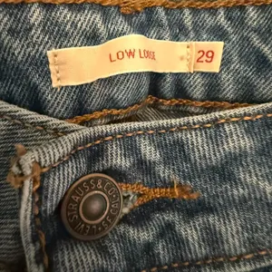 Levi’s Low Loose in medium wash jeans . Size 29 NWT (Sold at Free People) thumbnail 2