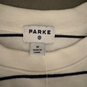New Parke x Target navy and white striped tee and floral hair clip thumbnail 2