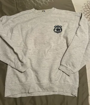 Cotton Blue Comfortable gray crewneck sweatshirt featuring a logo on the chest. Grey and black streetwear-inspired sweatshirt #skaterstyle thumbnail 1