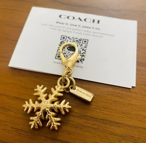 Coach Gold Snowflake Keychain thumbnail 1
