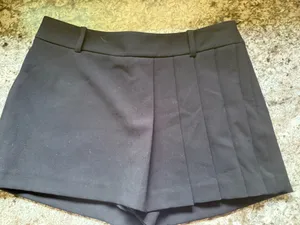 ZARA This is a black pleated mini skort thumbnail 1