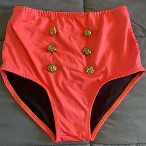 Coral high-waisted bikini bottoms with decorative gold buttons thumbnail 1