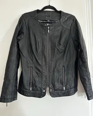 Odyn Women's Black Vegan Leather Moto Jacket. Quilted. Metal Accents. Zipper thumbnail 1
