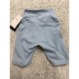 Nike One Womens High Rise 8 Inch Biker Shorts Light Blue FZ6758-440 XS‎ thumbnail 3