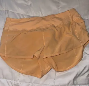 Lululemon orange low rise speed up shorts thumbnail 1