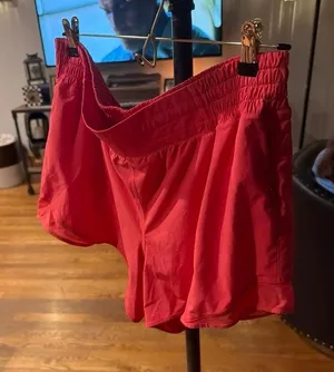 Lululemon Hotty Hot High-Rise Short in a bright coral-pink women's 14 thumbnail 1