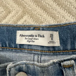 Abercrombie High Rise Distressed Jean Shorts thumbnail 5