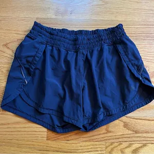 Athleta navy blue running shorts size XS thumbnail 1