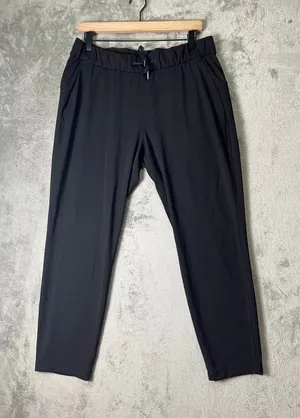 Lululemon On The Fly Pant Athletica Black Drawstring Travel Stretch Pants 10 thumbnail 1
