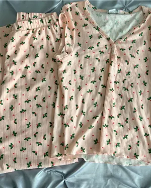 Women’s Pink Ribbed Holiday Pajama Set with Holly Print thumbnail 1