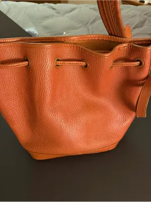 Dooney & Bourke Orange Pebble Leather Bucket Bag with Tassel Drawstring thumbnail 5