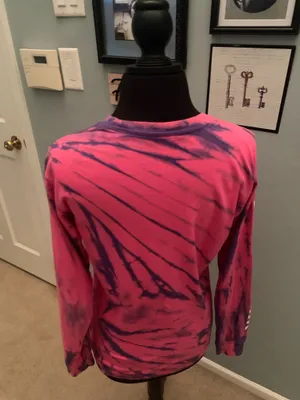 This is a pink and purple Vans tie-dye long-sleeve t-shirt featuring the brand's signature white logo on the chest. thumbnail 10