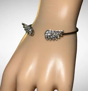 Beautiful silver angel wings bracelet with rhinestone incrusted design! thumbnail 1