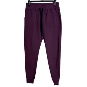 ZYIA Active Unwind Drawstring Tapered Joggers with pockets in Plum, size S thumbnail 2