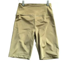 Girlfriend Collective high-waisted bike shorts in khaki green XS thumbnail 3