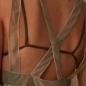 Free People Nights Out Bodysuit. Snakeskin print in moss green. Size XS thumbnail 3