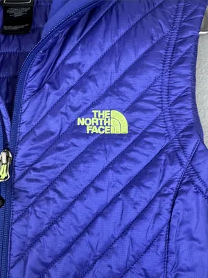 The North Face Women's Quilted Vest in purple with Lime Accents Size: small thumbnail 2