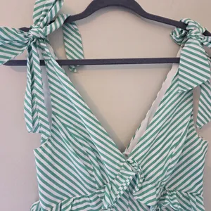 BCBGeneration Green and White Striped V-Neck Tie Shoulder Dress thumbnail 2