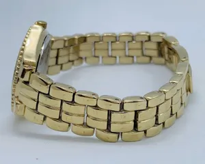Armitron 27mm ladies Quartz analog WR watch gold tone MOP dial 6.5”-7” thumbnail 3