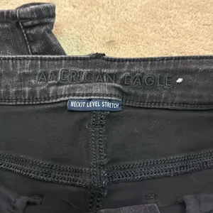 American Eagle black ripped jeans thumbnail 4