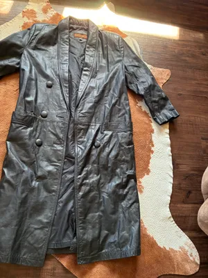 Vintage Black leather Rock Creek trench coat size small The outer shell is 100% genuine leather The lining in Nylon! Missing 1 button on the right side in pictures 1-4 not noticeable or even a snag there!!! thumbnail 2