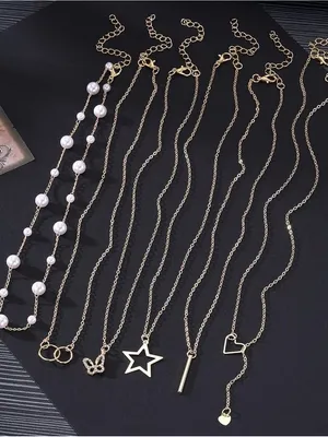 14K Gold Plated Multi-Layered Necklace with Star, Key, and Butterfly Charms thumbnail 5