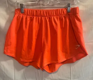 Gymshark Women’s Medium Orange athletic shorts thumbnail 1
