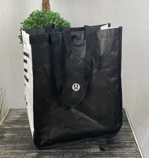 Lululemon Black & White Medium Shopping Tote Bag thumbnail 1