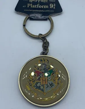HARRY POTTER Hogwarts house crest and platform 9 3/4 keychain new in pac… thumbnail 5