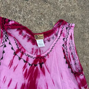 Pink INGear tie-dye sleeveless umbrella dress featuring black floral embroidery. thumbnail 3