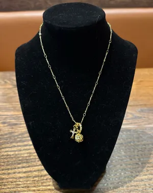 Gold Cross Orb Pendant Necklace thumbnail 1
