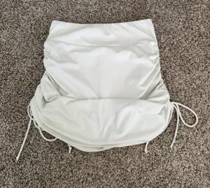 White mini skirt with built in shorts thumbnail 1
