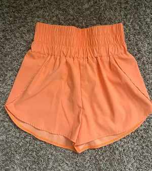 orange shorts thumbnail 1