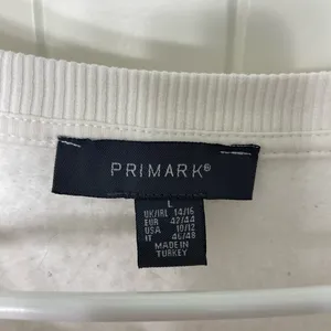 EUC Primark‎ women’s white colored sleeve fleece lined decal crewneck large thumbnail 4